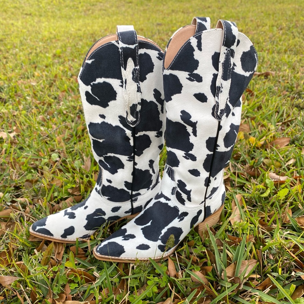 Cow print cowboy boots